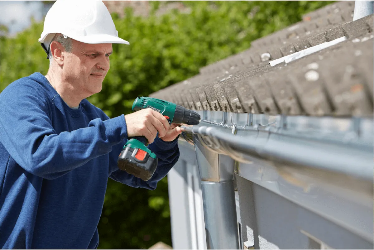 Close-up of professionally installed gutter system along home siding