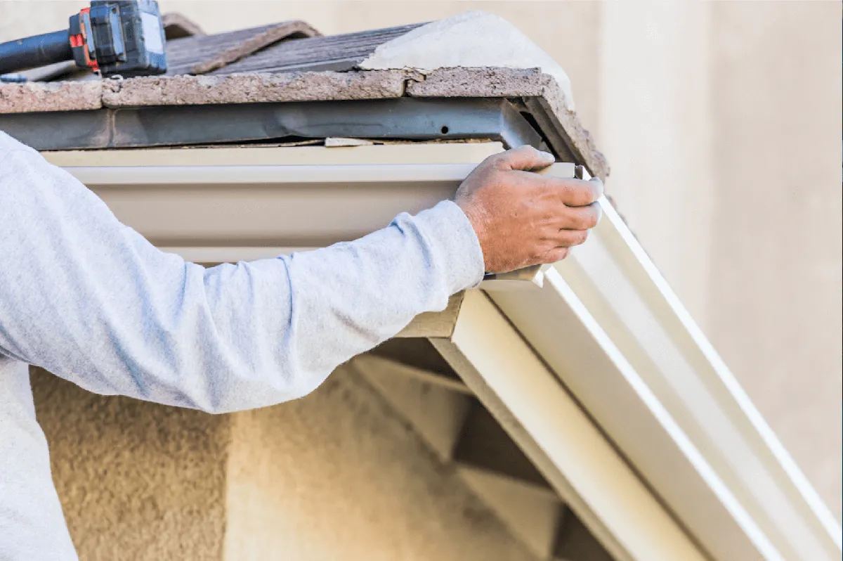 Close-up of micro-mesh gutter guard installed on a residential gutter system